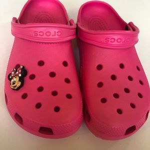 Pink Crocs with Disney Jibbitz